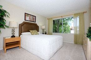 Santa Clarita apartment for rent - a bedroom with a large bed and a window