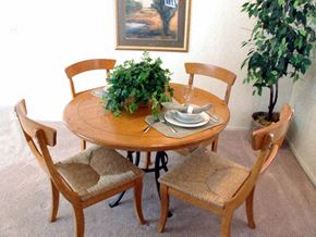 Santa Clarita apartment for rent - a dining room table with chairs and a potted plant