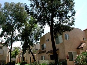 Santa Clarita apartment for rent - an apartment building with trees in front of it