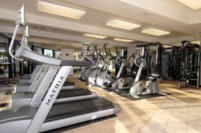 Los Angeles apartment for rent - a row of treadmills and other exercise equipment in a gym