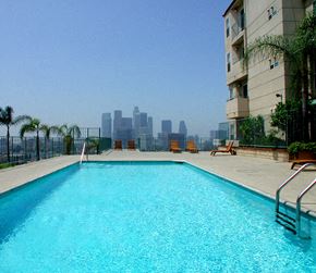 Los Angeles apartment for rent - the pool on the roof of an apartment building with a view of the city