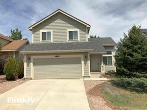 Colorado Springs house for rent - A house with a garage door numbered 4663 is for sale.