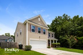 Goose Creek house for rent - A house with a garage and a driveway is for sale.