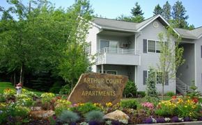 Spokane apartment for rent - A sign in front of a building that says Arthur Court Apartments.