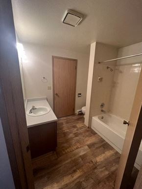 Spokane apartment for rent - a small bathroom with a sink and a tub
