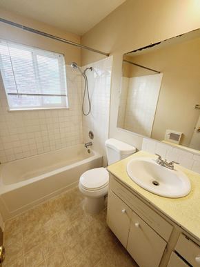 Spokane apartment for rent - a bathroom with a sink toilet and a bath tub