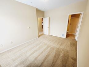 Medical Lake apartment for rent - A room with carpeted floor and two open doors.