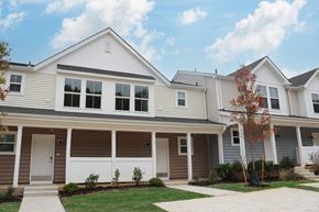 Sicklerville apartment for rent - the exterior of a white house with brown and white siding