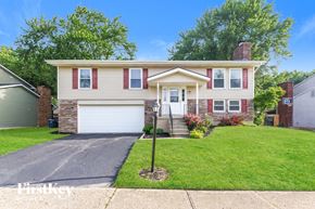 Dayton house for rent - a house with a lawn in front of it