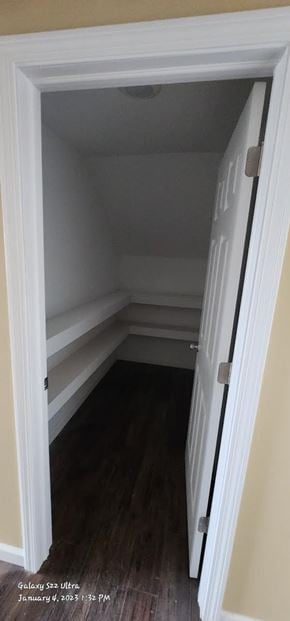 Bolton apartment for rent - A white door is open to a room with wood flooring.