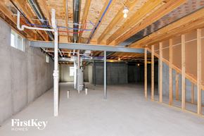 Lake St Louis house for rent - the inside of a building that is under construction and has wood framing on the walls