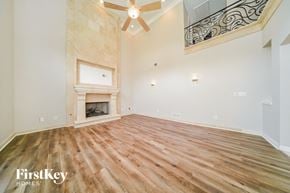 Atlanta house for rent - the living room has a fireplace and wood flooring