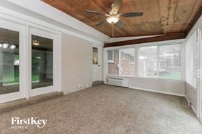 Kirkwood house for rent - a living room with a ceiling fan and a large window