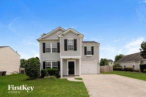 Indian Trail house for rent - A two-story house with a garage is for sale by FirstKey Homes.