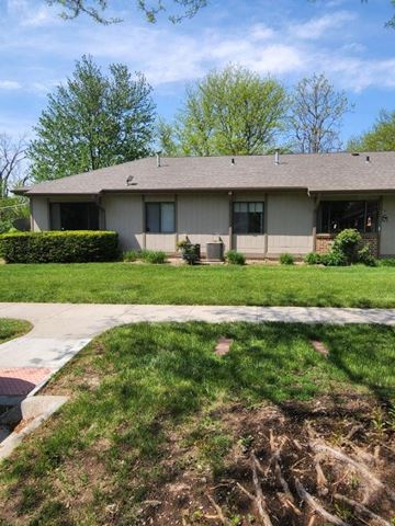 Plattsmouth apartment for rent - a house with a lawn in front of it
