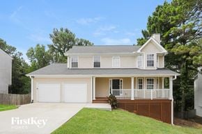 Winder house for rent - A two-story house with a garage and a porch.