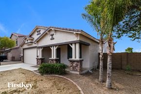 Laveen house for rent - a house with a palm tree in front of it