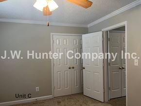 Wilson apartment for rent - A room with a J.W. Hunter Company Inc. sign on the wall.