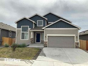 Colorado Springs house for rent - A two-story house with a garage is for sale.