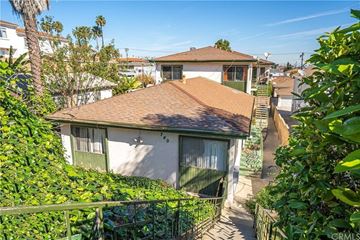 Los Angeles apartment for rent - a house with a red roof on a city street