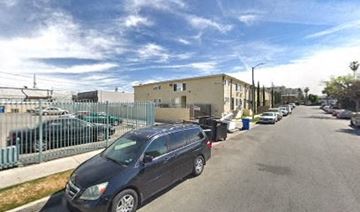 North Hollywood apartment for rent - a row of cars parked on the side of a street