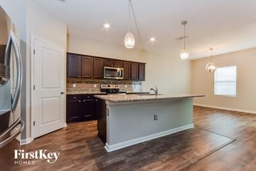 Davenport house for rent - A kitchen with a countertop and cabinets is shown.