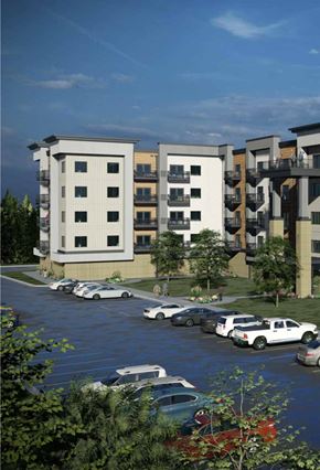 Faribault apartment for rent - a rendering of an apartment building with cars parked in a parking lot