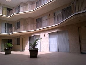 Los Angeles apartment for rent - a building with doors and a potted plant