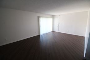 Los Angeles apartment for rent - an empty living room with wood floors and white walls