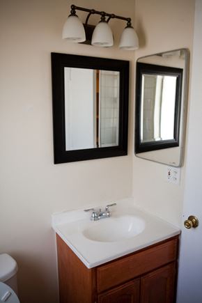 Los Angeles apartment for rent - a small bathroom with a sink and two mirrors