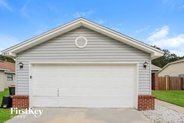 Jacksonville house for rent - the front of a garage with a white garage door