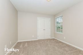 Antioch house for rent - an empty bedroom with a door and a window
