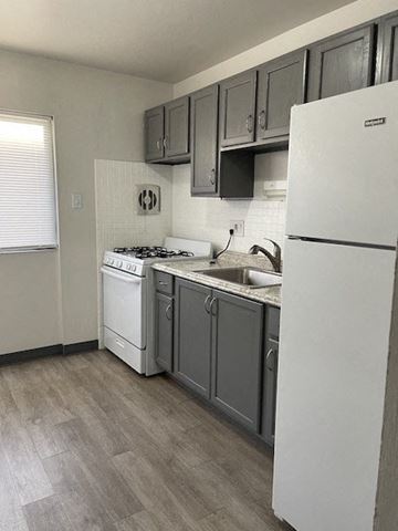 Jennings apartment for rent - a kitchen with a stove and a refrigerator
