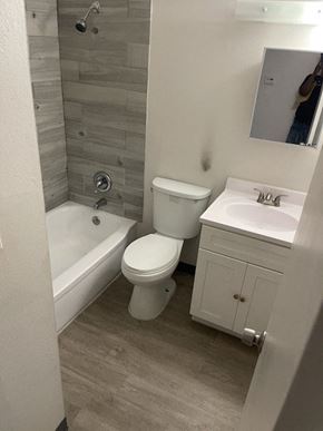 Jennings apartment for rent - a bathroom with a toilet and a tub and a sink