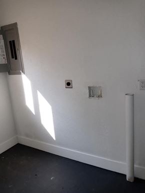 Jennings apartment for rent - a white wall with two outlets and a door