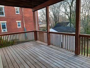Cincinnati house for rent - the deck of a home with a view of a brick building