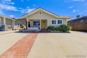 San Diego apartment for rent - A San Diego MLS listing photo of a single-story house with a yellow front door.