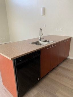 Nanaimo apartment for rent - A kitchen with a sink and a dishwasher.