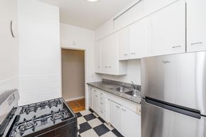 Oakland apartment for rent - A kitchen with a black and white checkered floor.