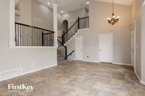 Kansas City house for rent - the great room with the staircase leading to the second floor