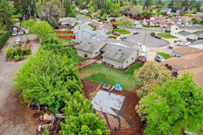 Yuba City apartment for rent - A residential area with a large house in the center.