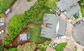 Yuba City apartment for rent - A residential area with houses and cars.