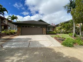Kapolei apartment for rent - a house with a driveway and a garage door