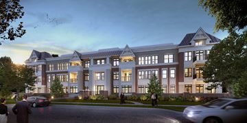 Highland Park apartment for rent - A large, modern building with a lot of windows and a car parked in front.