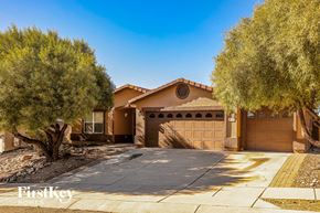Vail house for rent - A house with a brown garage door is for sale.