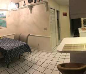 Fort Myers house for rent - a dining room with a table and chairs and a sink