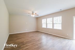 Goose Creek house for rent - the spacious living room with wood floors and a ceiling fan