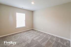 Goose Creek house for rent - the bedroom with carpeted flooring and a window