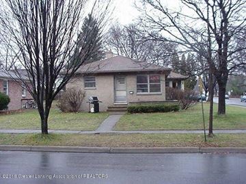 East Lansing apartment for rent - a small house on the side of the street