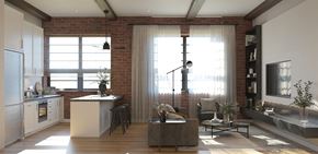 Providence apartment for rent - A modern kitchen with a brick wall and wooden floors.